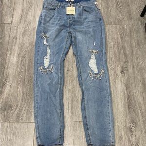 Light washed destroyed crystal jeans